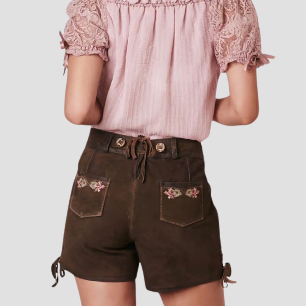 Elevate your look with these affordable lederhosen for women, featuring delicate floral embroidery. A perfect blend of quality, style, and budget-friendly pricing.