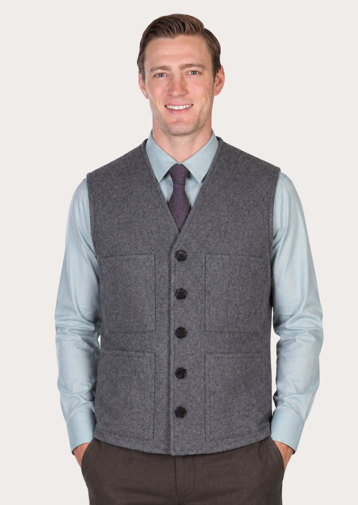 Heritage-style grey Loden waistcoat designed with functional pockets and authentic craftsmanship