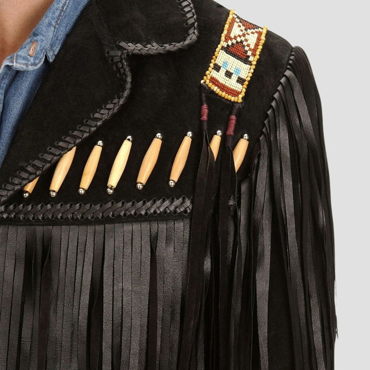 Comfortable sheepskin leather jacket with fringe accents in black.