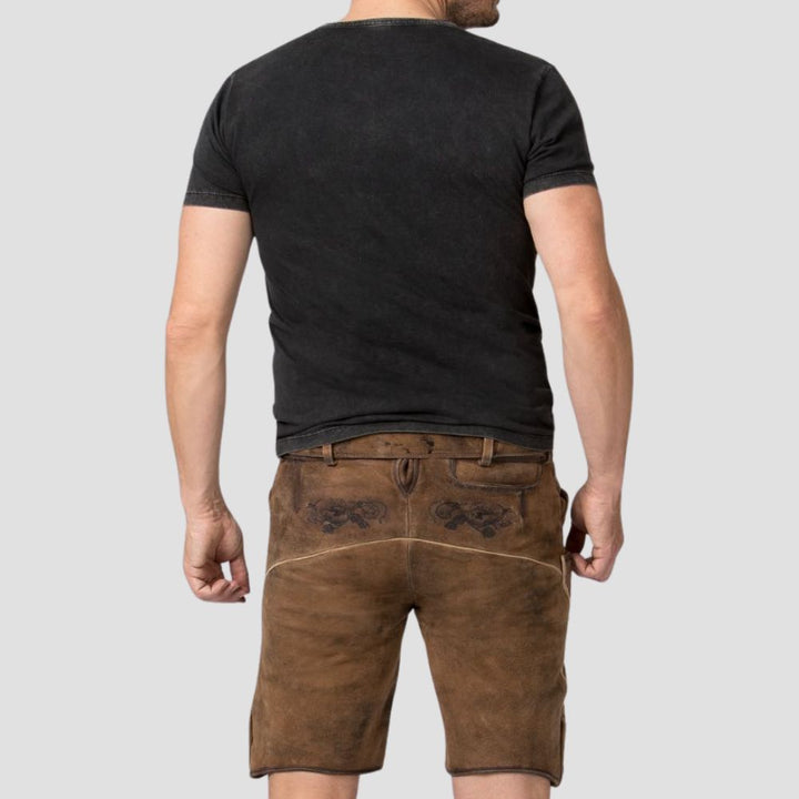 Embroidered with intricate designs, these stylish men’s Lederhosen bring a touch of sophistication to any German cultural event.