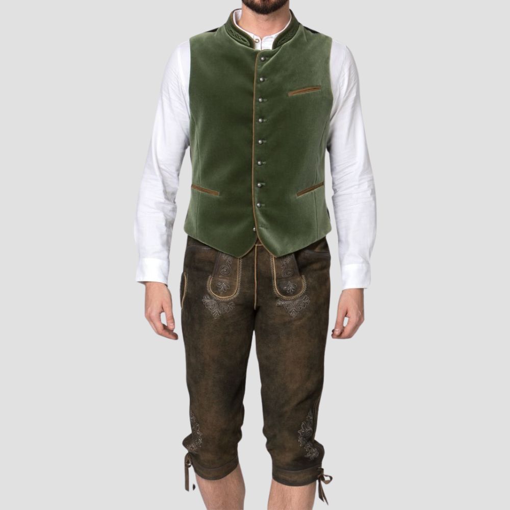 Add a touch of Bavarian tradition to your wardrobe with this green velvet Trachten vest, perfect for any festive occasion.