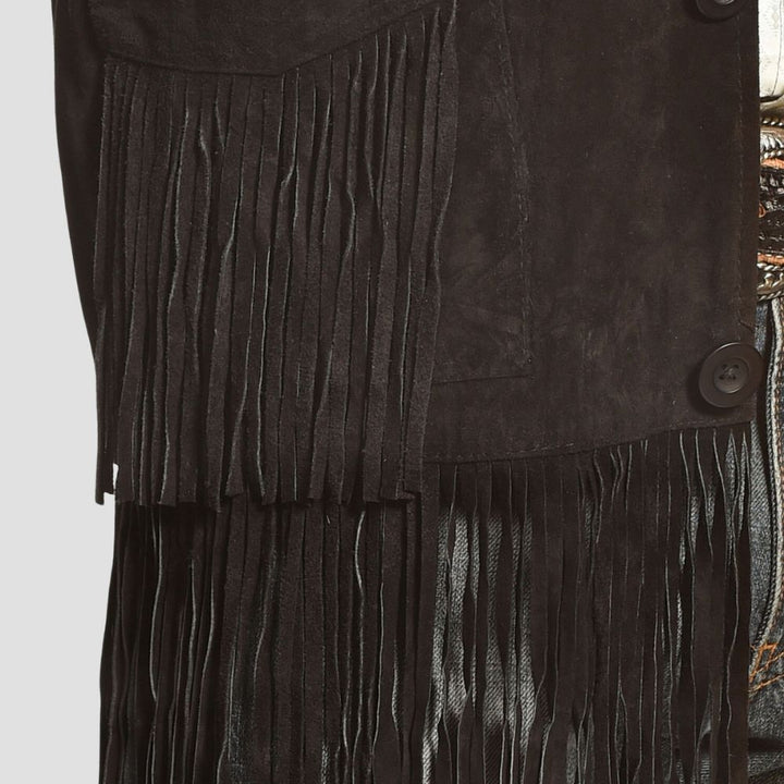 This timeless black suede fringe jacket brings a touch of western sophistication to your everyday outfits.