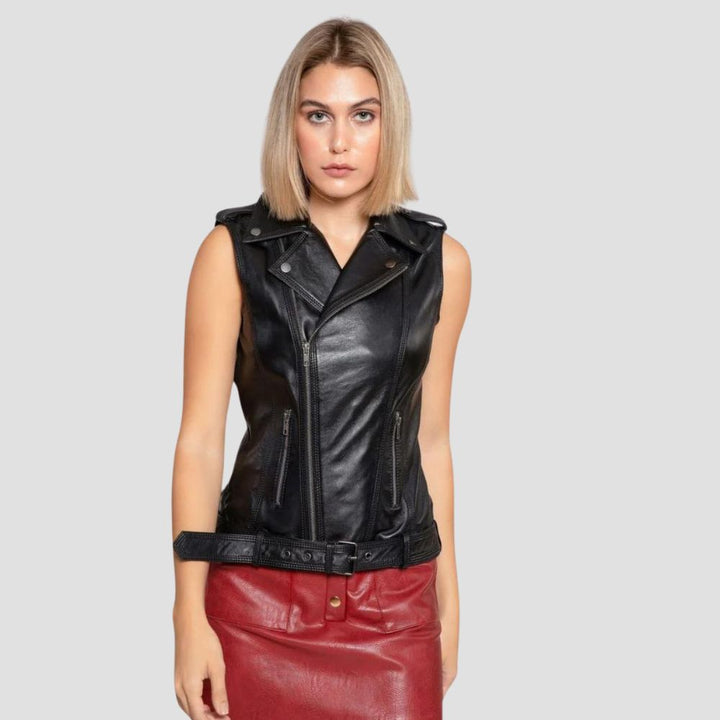 A chic women’s motorcycle leather vest featuring sleek zipper details, designed for a modern, stylish, and bold look.