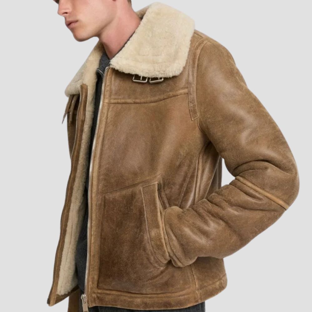 Elevate your winter wardrobe with this brown fur leather jacket, combining rugged appeal with sophisticated warmth.