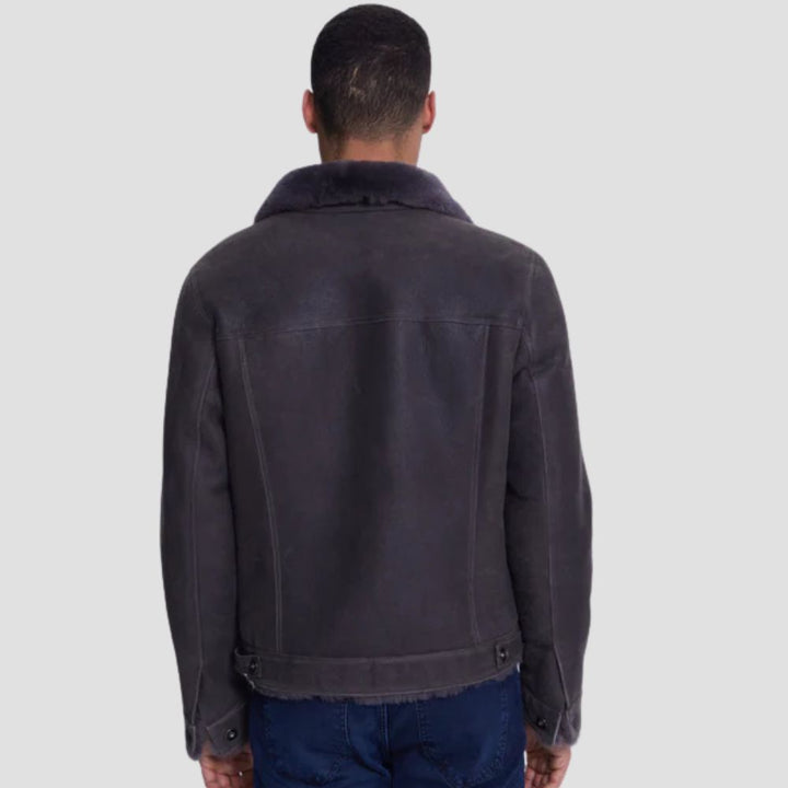 Gray suede leather trucker jacket with cozy shearling fur interior.