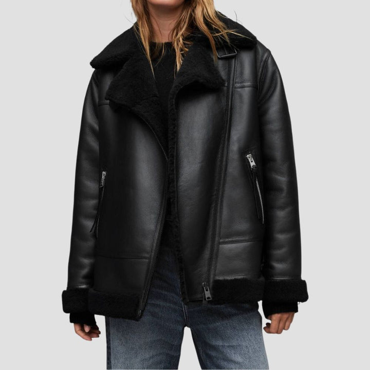 This genuine female shearling jacket offers both warmth and luxurious style. Made with high-quality shearling, it’s perfect for staying cozy in colder months.