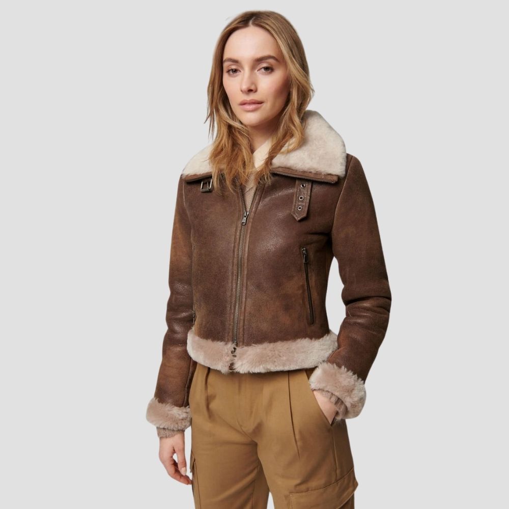 Stay warm and stylish with this chic shearling leather jacket for women. Perfect for everyday winter wear, it combines cozy shearling with sleek leather for a modern look.