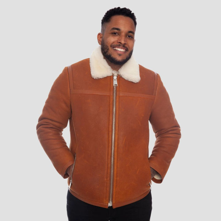 Men’s sheepskin shearling jacket with thick white faux fur lining.