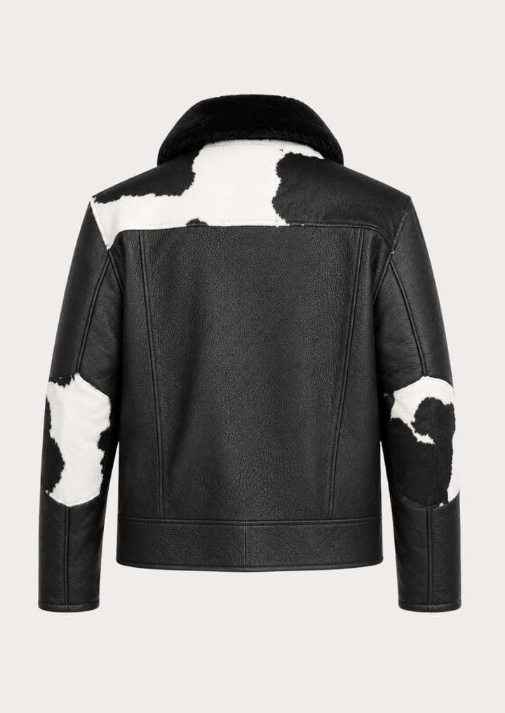 Men’s cowhide bomber jacket featuring natural black and white hide pattern