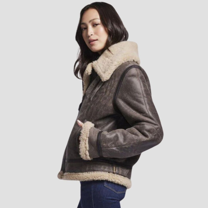 This B3 bomber jacket for women offers the perfect blend of winter warmth and fashion-forward design. Its shearling and leather make it a must-have for bold looks.