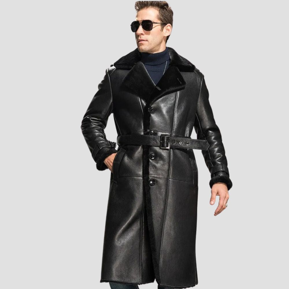 Men's black leather shearling coat with a luxurious fur-lined collar and cuffs, perfect for winter.