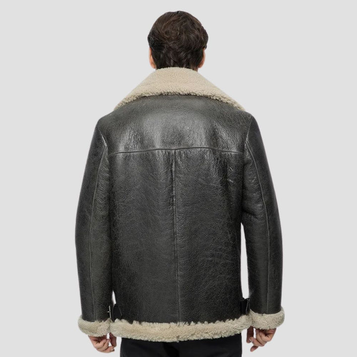 Black leather jacket with faux fur lining for comfort and style.