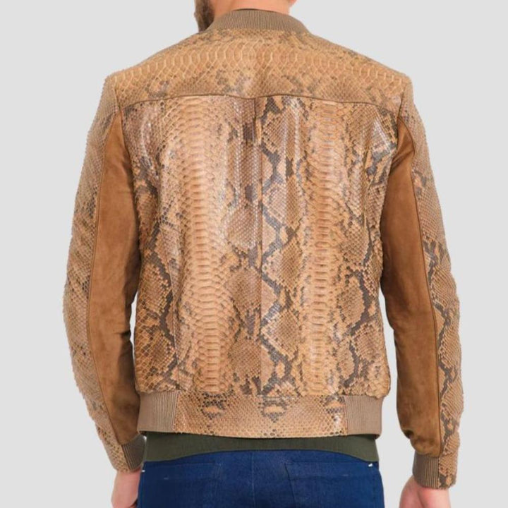 Fashionable brown bomber jacket with embossed python pattern.