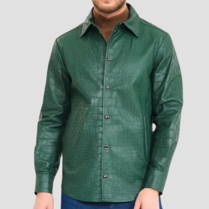 Front view of a green crocodile-embossed leather shirt with a glossy finish and stylish button closure