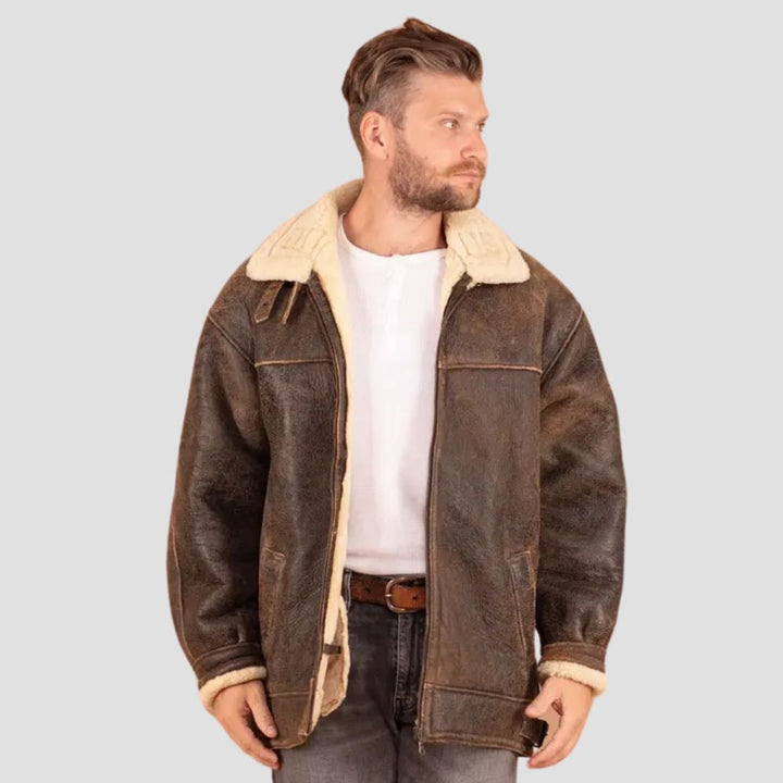 Premium lambskin leather coat with faux shearling lining.