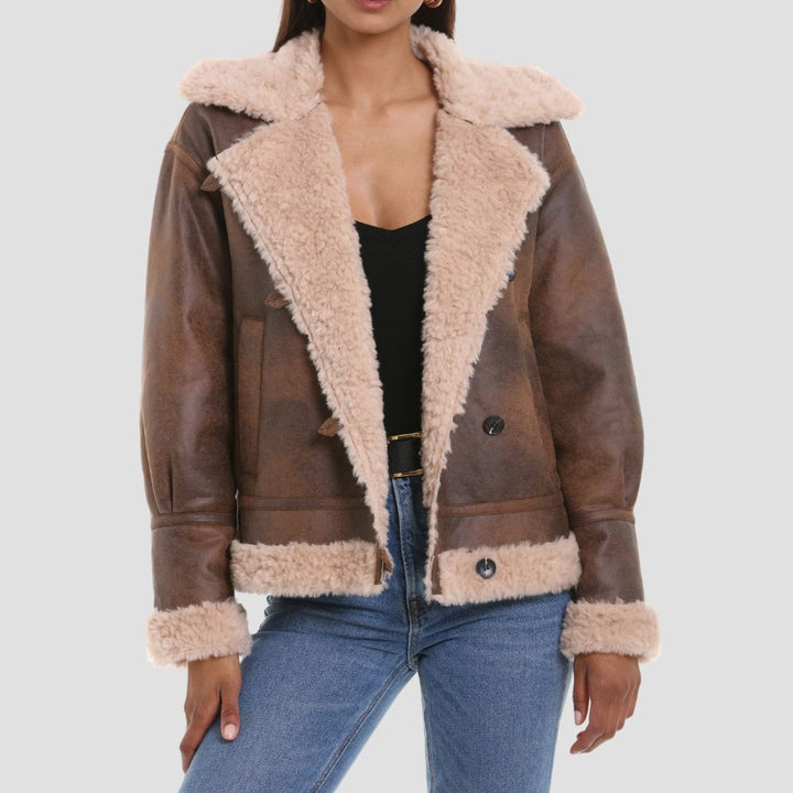 Shop a high-quality B3 bomber leather jacket for women designed for cold weather. The premium leather and plush shearling ensure comfort, warmth, and a classic aviation-inspired style.