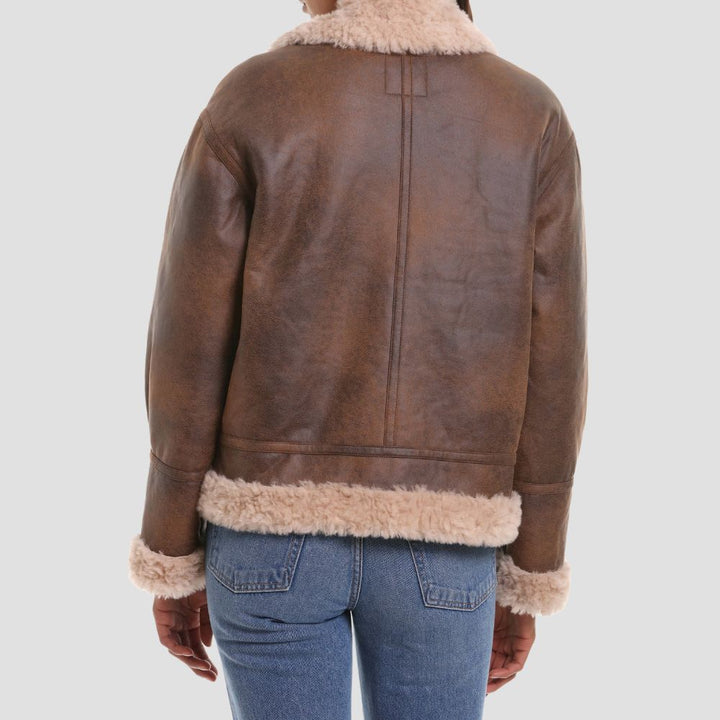 This high-quality B3 bomber leather jacket for women offers cold weather protection with timeless style. The soft shearling lining and tough leather make it a durable yet fashionable choice.