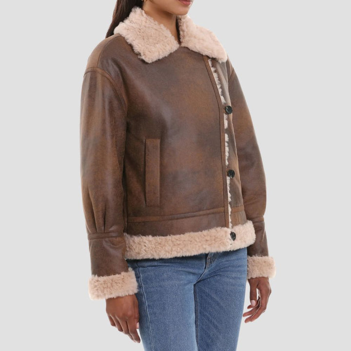 This high-quality B3 bomber leather jacket for women is perfect for cold weather. The shearling interior and sturdy leather exterior provide warmth and a timeless aviator look.