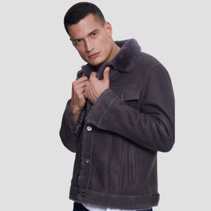 Men’s trucker jacket in gray suede with warm shearling lining.