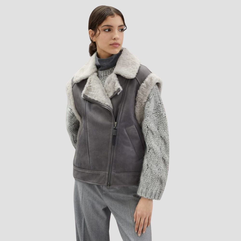  Shop these handmade sheepskin shearling vests for ladies. Crafted for warmth and style, they offer a cozy, luxurious feel perfect for any cold-weather outfit.