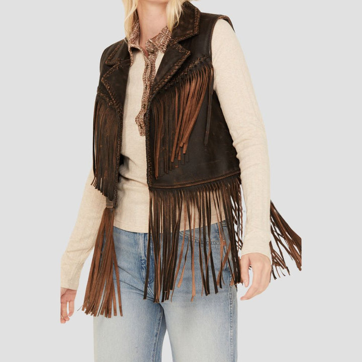 A stylish fringed leather vest for women, offering a blend of western ruggedness and boho chic charm, perfect for layering over any outfit.