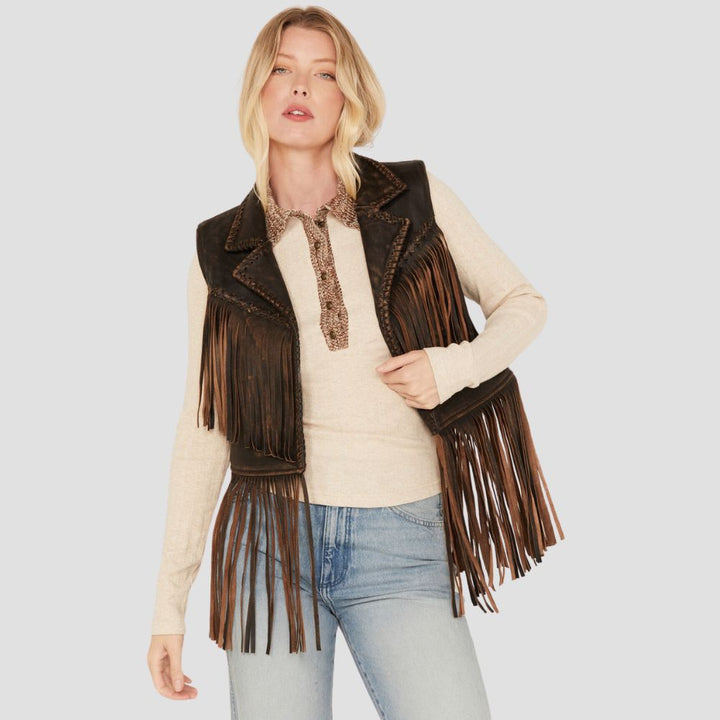 A fringed leather vest for women, designed with a western and boho chic aesthetic, perfect for adding a touch of vintage flair to casual outfits.