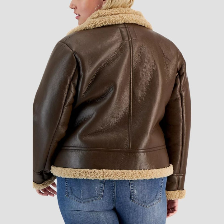  Add sophistication to your winter look with this chic B3 aviator leather jacket for women. Its trendy design features shearling and leather, offering both style and warmth.