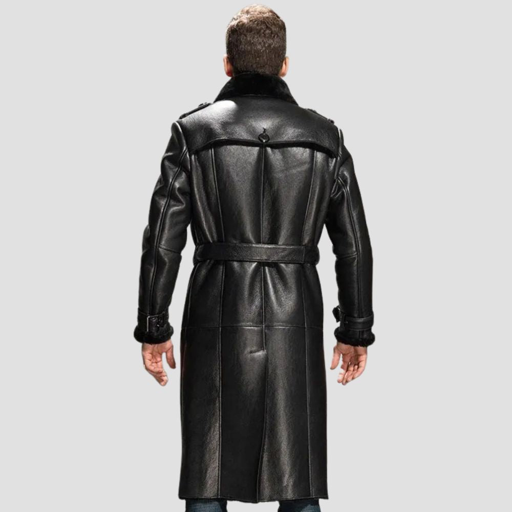 Close-up of a sleek black leather shearling coat for men, showcasing premium stitching details.