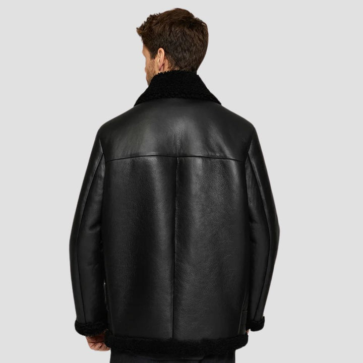 Stylish black leather B3 bomber jacket for winter wear.