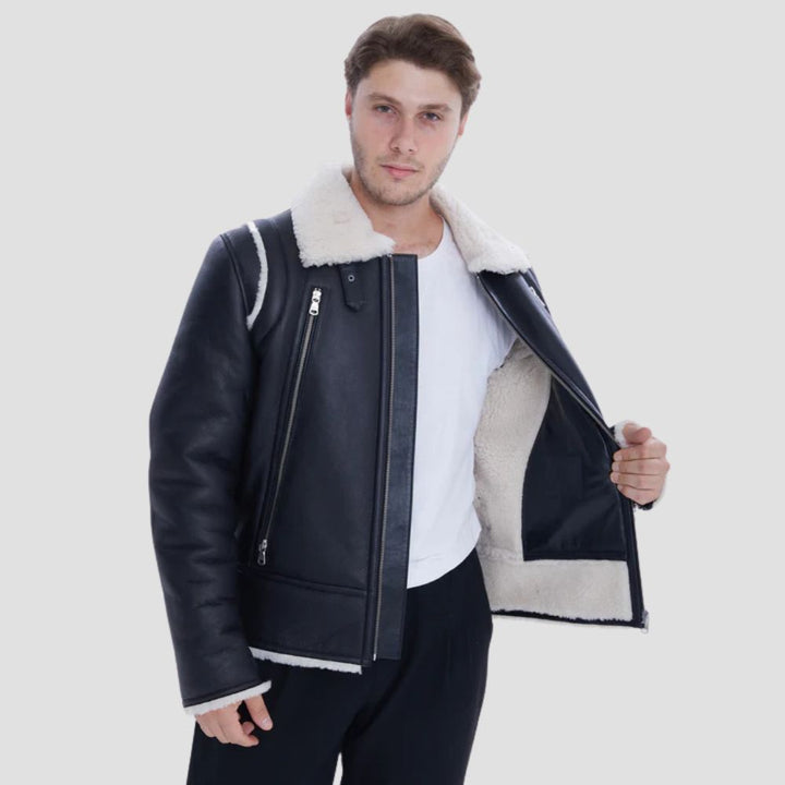 Casual black sheepskin leather jacket with white fur detailing.