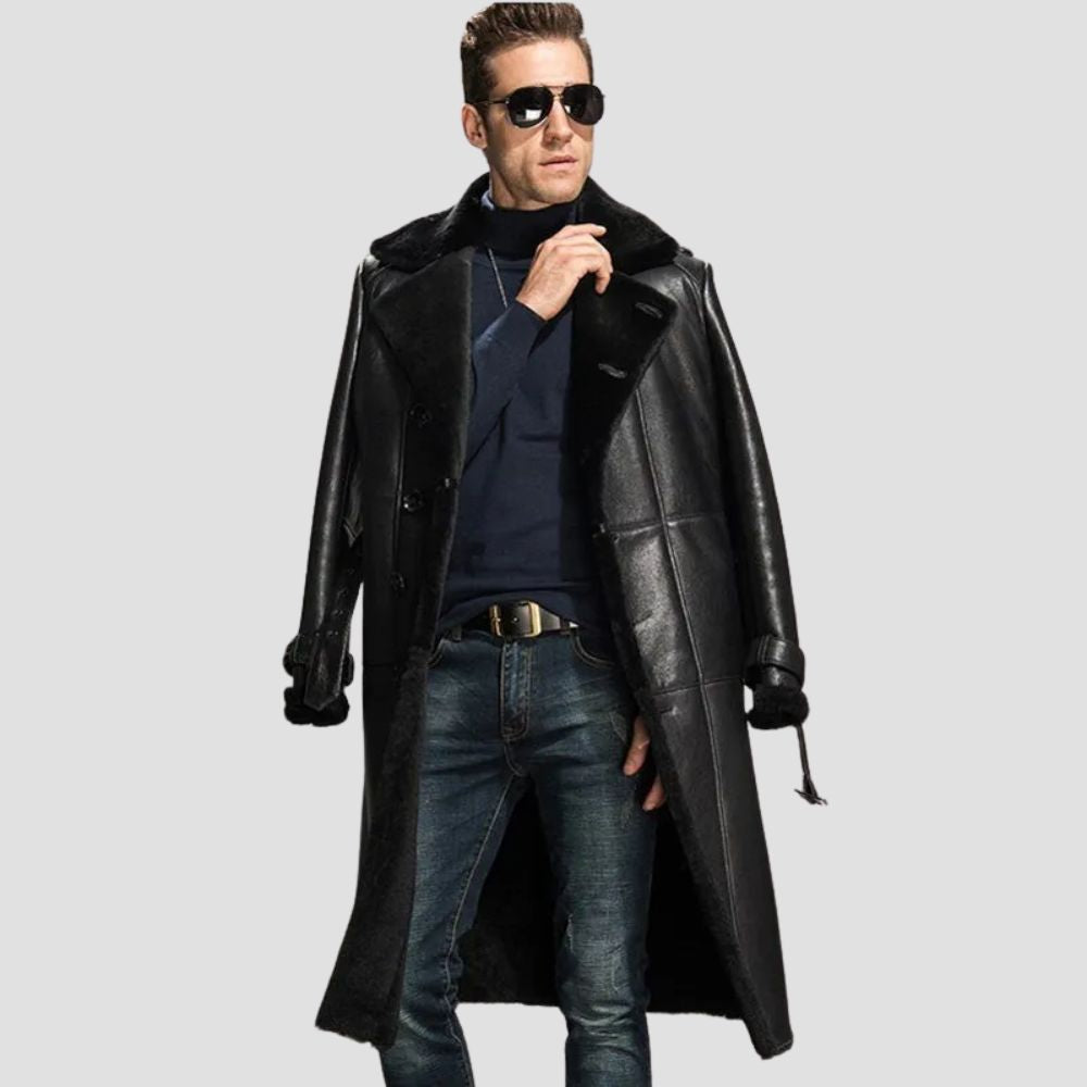 Elegant men’s shearling coat in black leather, styled for warmth and sophistication.