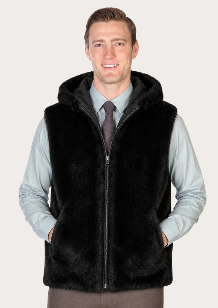Men's black faux fur hooded vest with full zip closure and luxury winter styling.