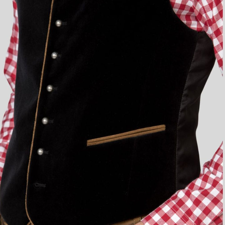 Crafted with precision, this black velvet Trachten vest blends traditional Bavarian style with modern sophistication.