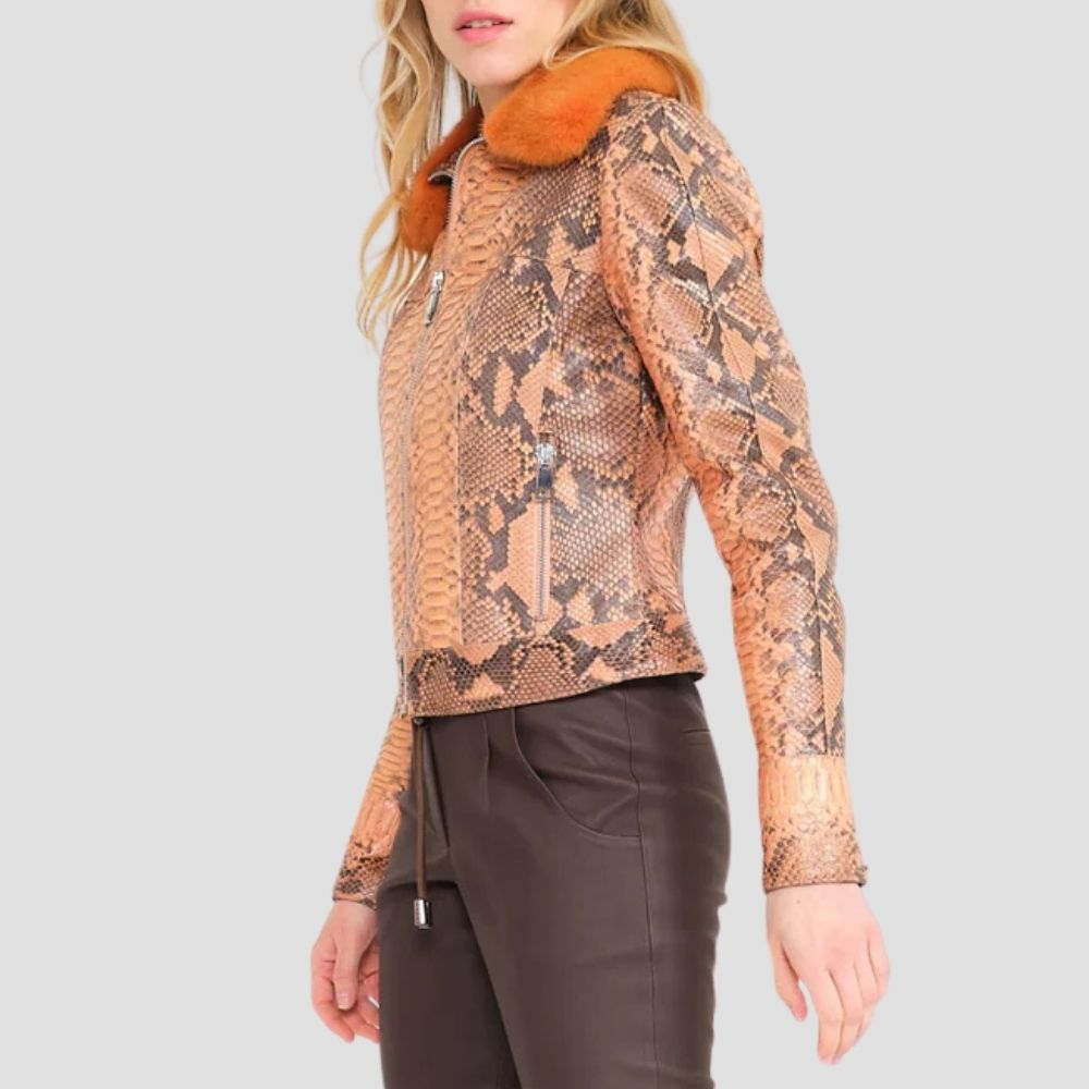 This modern ladies snake skin fur collar jacket is designed for urban fashion. With a bold snake skin exterior and a luxurious fur collar, it’s the perfect statement piece.