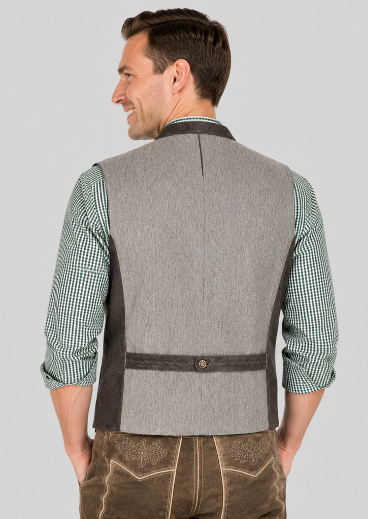 Traditional Alpine-style suede vest combining heritage design and intricate embroidery