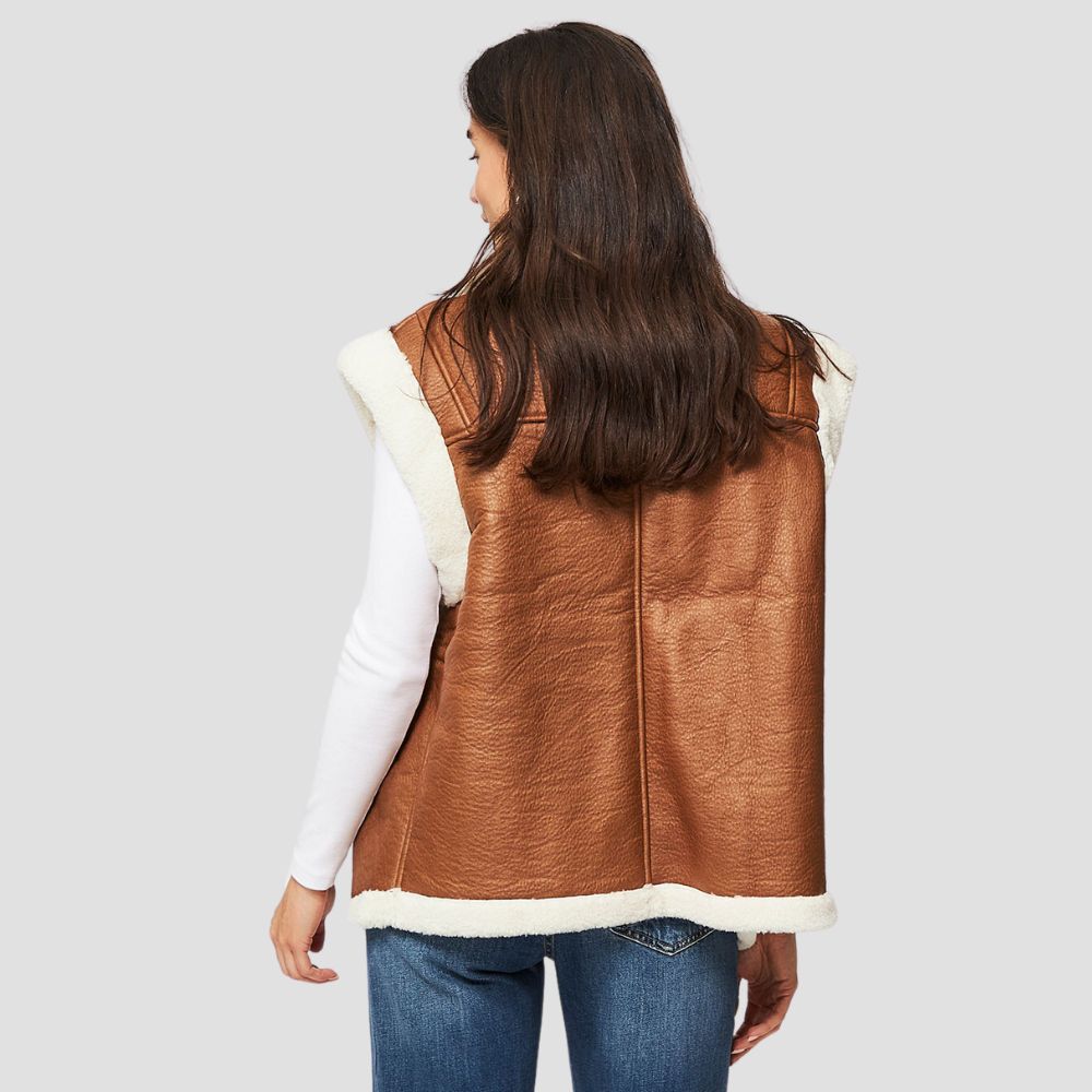 Elegant shearling leather vest with soft fur accents for women, designed to offer both style and comfort for chic winter looks.