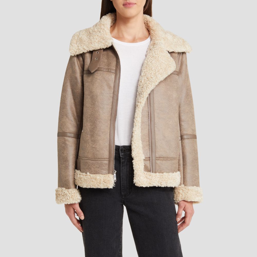 Elevate your wardrobe with a women’s fashion-forward aviator leather bomber jacket. This trendy jacket combines a timeless aviator design with sleek leather for bold looks.