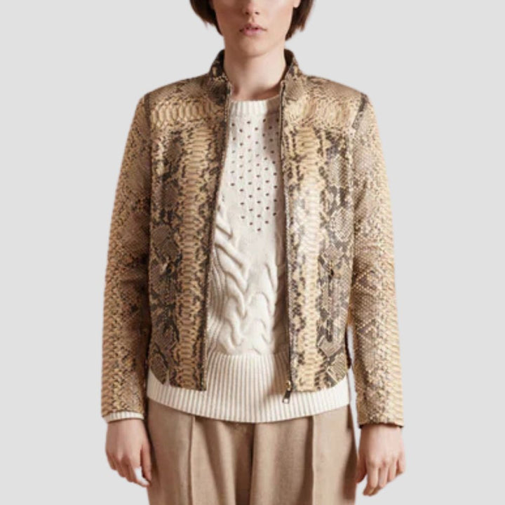 Stay bold and stylish in this ladies' snakeskin leather jacket. The modern moto style and sleek design make it a standout piece for any occasion.