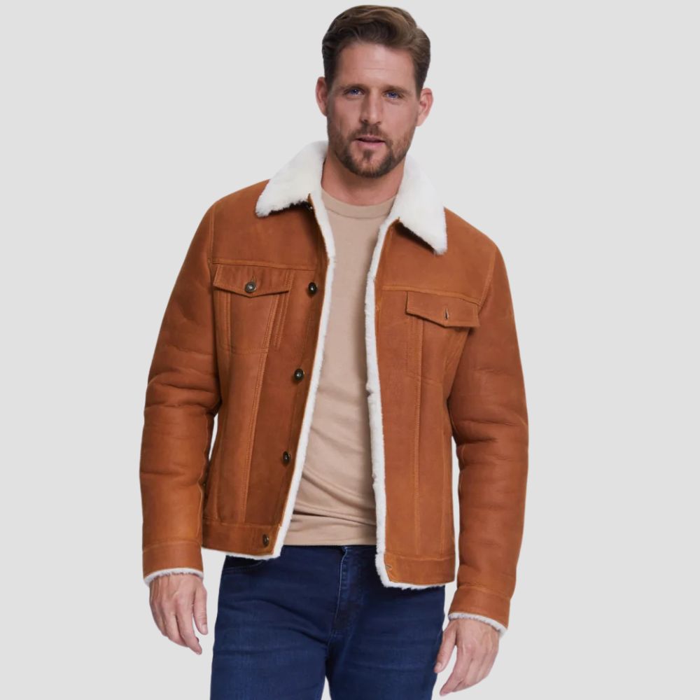 Brown leather trucker jacket with bold white faux fur interior.