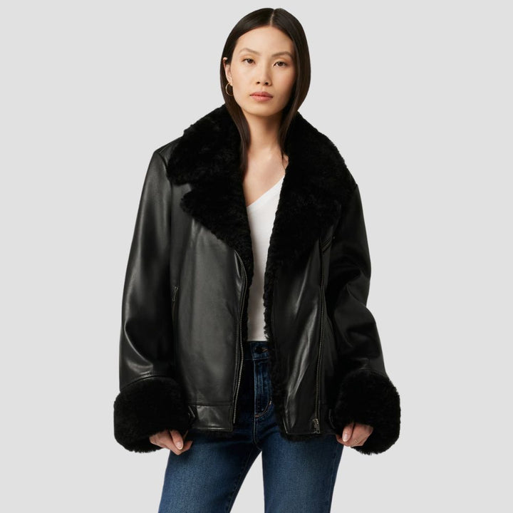  Shop a warm and cozy fur leather jacket for women, perfect for winter adventures. The soft fur and durable leather keep you stylish and protected from the cold.