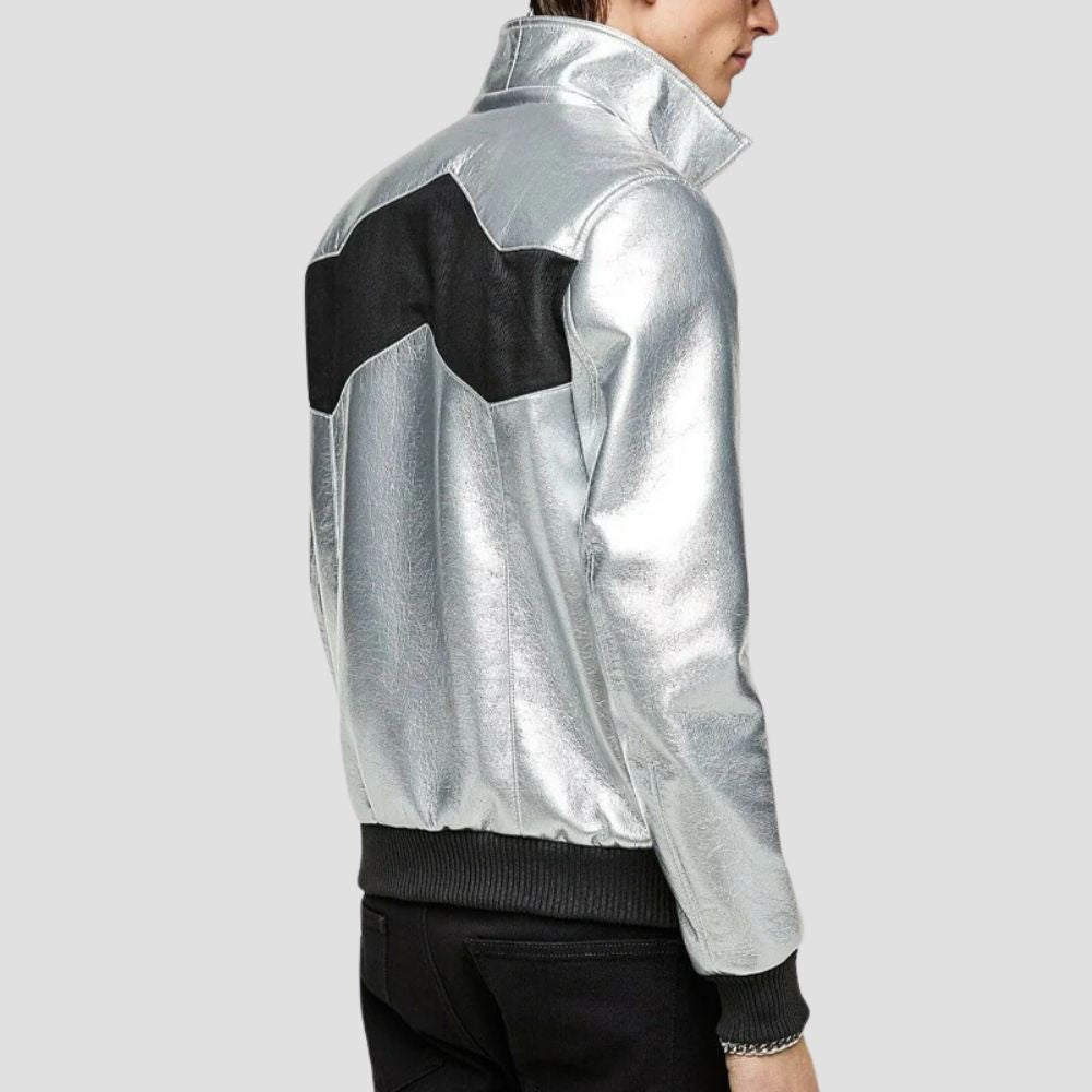 This silver metallic jacket combines sleek sophistication with bold urban flair for a standout fashion piece.