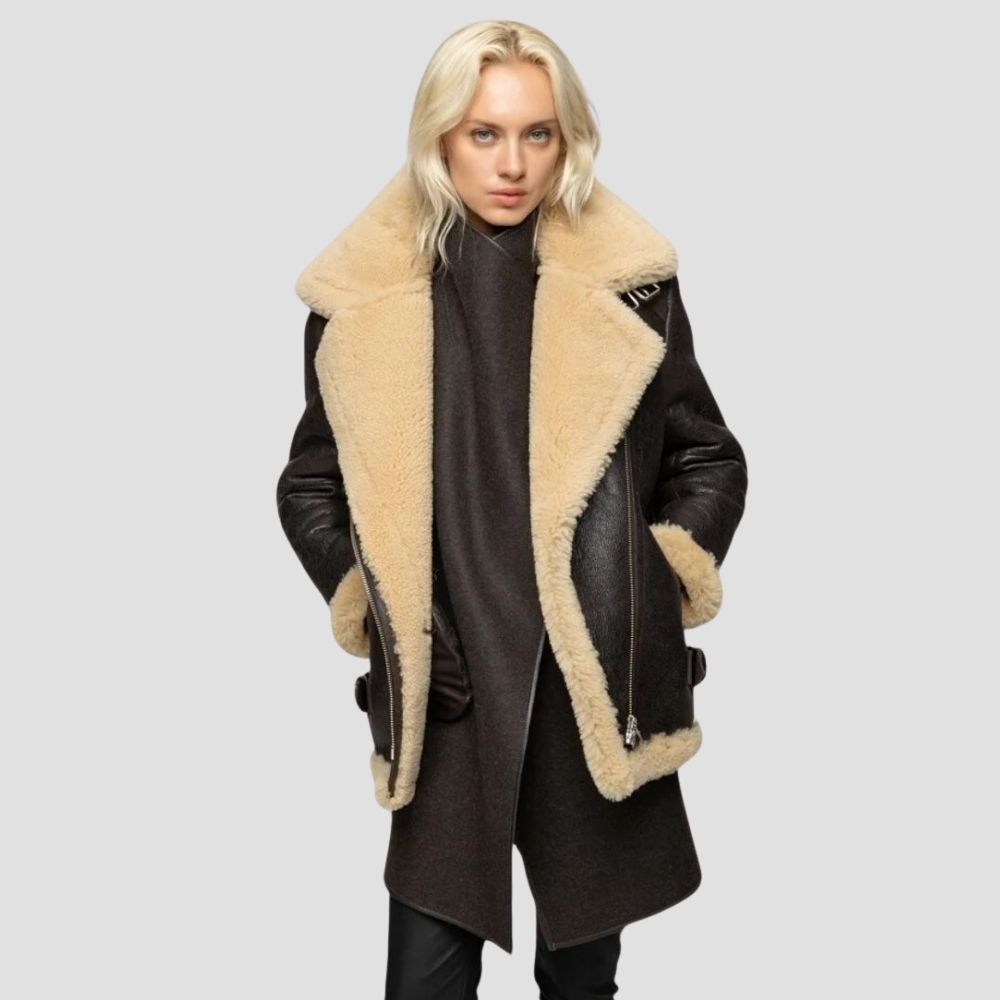 Shop this designer shearling leather jacket for women. Crafted for modern style, it features soft shearling and sleek leather for a high-fashion, cozy winter look.