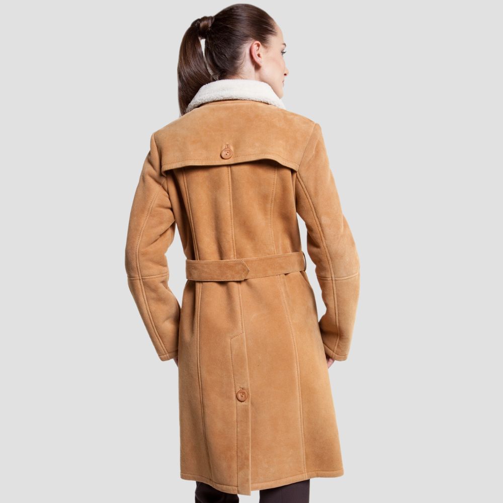  A must-have winter piece, this brown suede trench coat for women combines chic style and warmth, featuring a plush shearling lining for extra coziness.