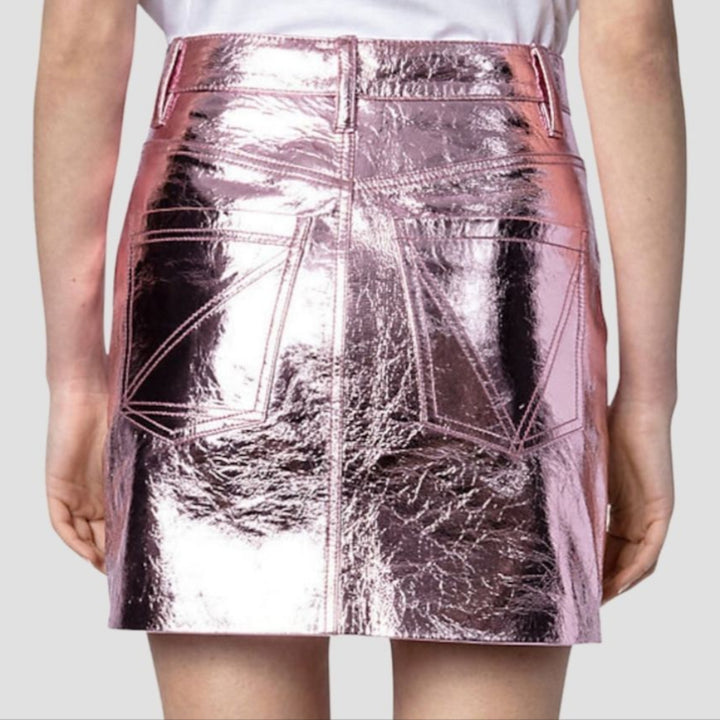 Trendy women’s leather metallic skirt with a striking shiny finish, great for creating fashionable, edgy outfits.