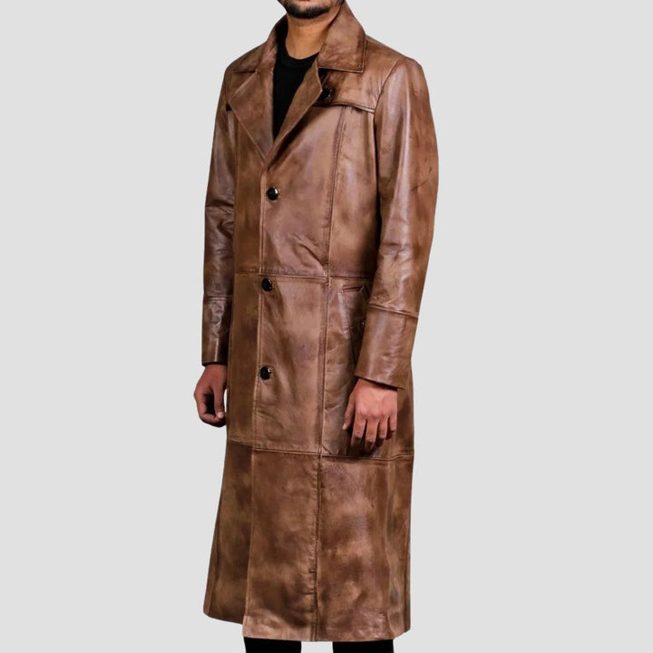 Add a touch of sophistication to your winter outfits with this high-quality distressed leather trench coat.