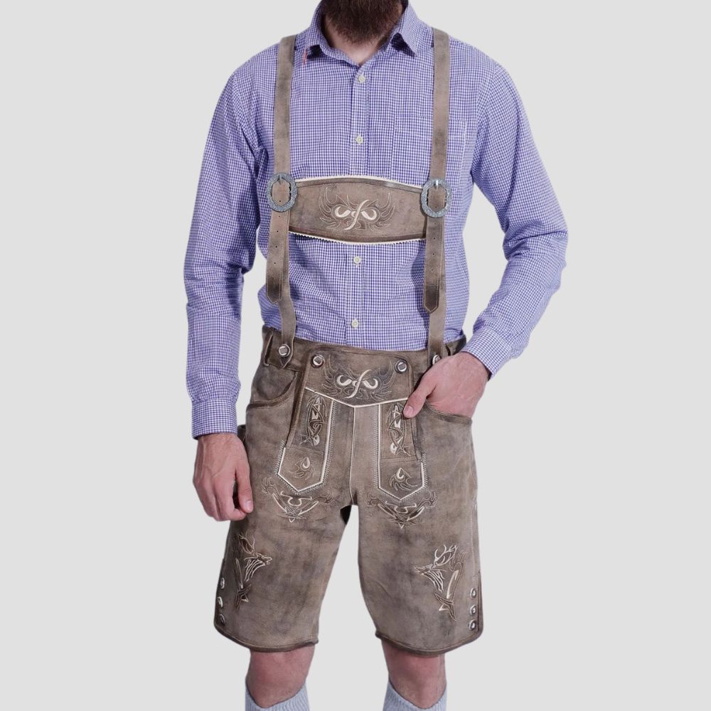 Celebrate in style with these trendy men’s Lederhosen, featuring suspenders and designed for festive occasions like Oktoberfest.