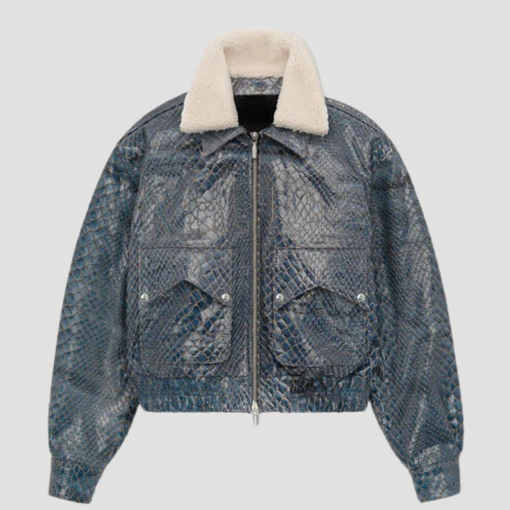 Designed for bold style enthusiasts, this snakeskin leather jacket features a premium fur collar for added sophistication.