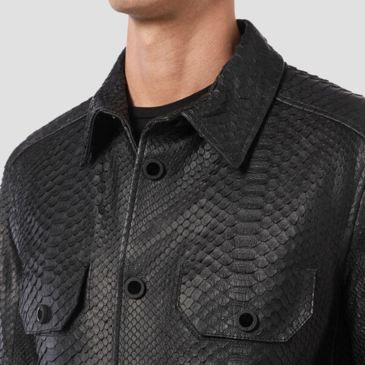 Men’s black cowhide leather shirt with crocodile texture and chest pockets.