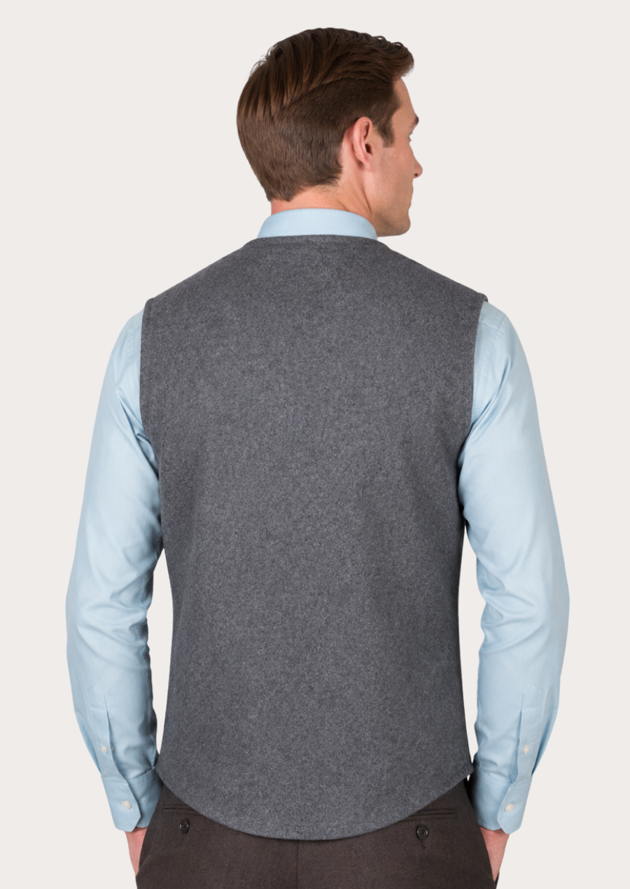 Traditional grey Loden vest with patch pockets for men and timeless Alpine elegance