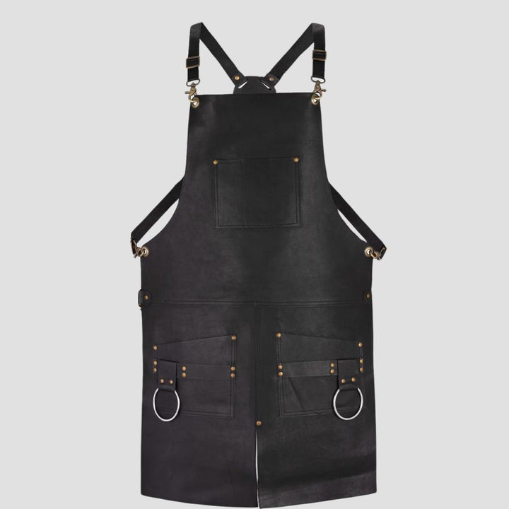 Shop this trendy leather apron for cooking. Made from premium full-grain leather, it features a split-leg design with 2 pockets and a tool holder, ideal for chefs, butchers, and BBQ lovers.